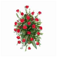 Crimson Departure Standing Spray · Send your loved one off with a truly classic standing spray filled with stunning red roses s...