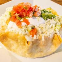 Taco Salad · Ground Beef or Shredded Chicken* - Crispy shell filled with a choice of ground beef or shred...