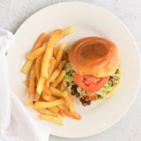 Chicken Sandwich* · Grilled chicken breast on a sourdough bread, lemon lime aioli, lettuce, tomatoes, and avocad...
