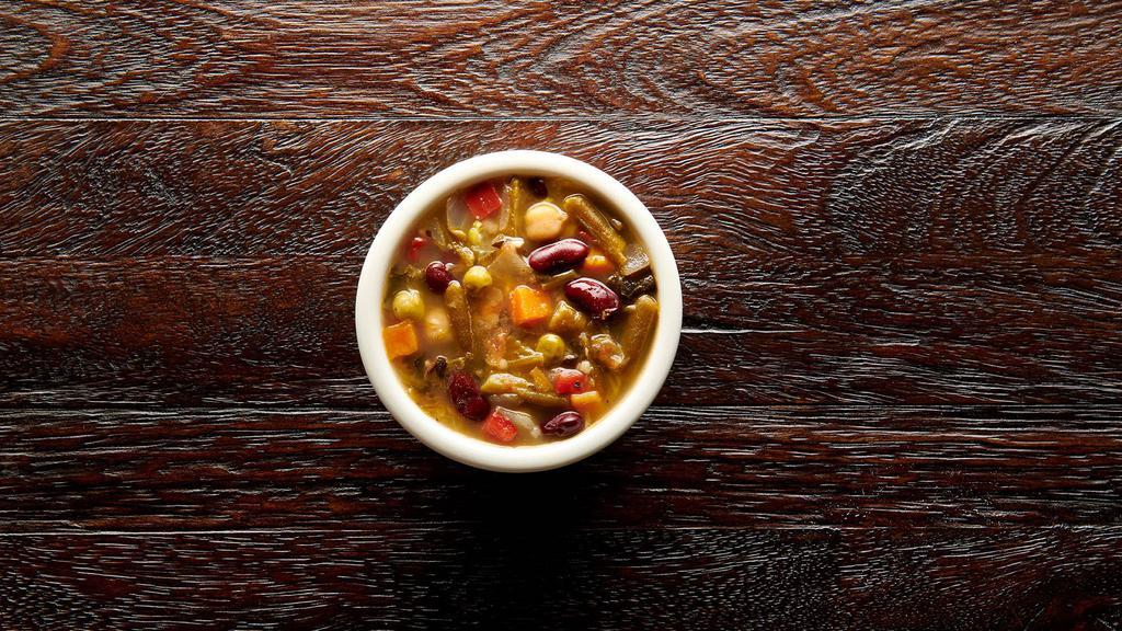Cup Organic Garden Vegetable Soup (V) (90 Cal)    · This updated classic recipe features a dozen hearty, certified-organic ingredients: cabbage, onions, carrots, celery, garlic, kidney beans, peas, green beans, tomatoes, garbanzo beans, red bell pepper and spinach.
