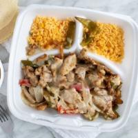 Fajitas De Pollo (Chicken Fajitas) · Marinated grilled strips of chicken seared with cheese, onions, and bell peppers,  topped wi...