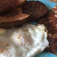 Breakfast Plate · Two eggs, choice of meat, hash browns, or grits with toast.
