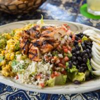 Mexican Cobb Salad · Gluten-free. Grilled chicken breast, chopped romaine, cotija cheese, black beans, charred co...
