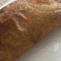 Empanada Venezolana · These are Moises's famous empanadas with varied fillings. Made with cornmeal dough, salt, an...