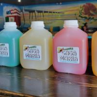32Oz Margarita Jug · Choose One of our delicious flavors:  Lime, Strawberry, Mango, Rasberry, Passion Fruit, or B...