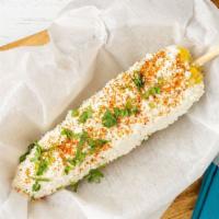 Mexican Street Corn Only Saurday And Sunday · Corn on the cob topped with mayonnaise, queso fresco, cilantro, and a blend of Mexican spices.