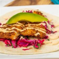 Hot Fish Taco · Fried fish. Made with onions, avocado, lime habanero cabbage in topped with especial salsa.