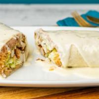 California Burrito · A flour tortilla rolled and stuffed with grilled chicken, rice, refried beans, lettuce, toma...