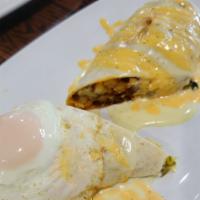 Sunrise Burrito · A flour tortilla rolled and stuffed with chorizo, scrambled eggs, French fries and guacamole...
