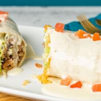 Burrito Panzón · Pork marinated stuffed and rolled with rice, lettuce and sour cream. Topped with cheese dip ...