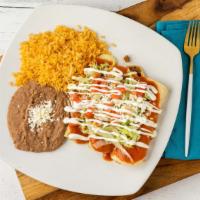 Enchiladas Supreme · Supreme combination, one chicken, one ground beef and one cheese enchilada stuffed in corn t...