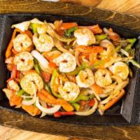 Fajitas · Choice of chicken or steak marinated in our special recipe, then grilled with onions, bell p...