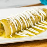 Enchiladas Michoacana (Singles) · Three corn tortillas stuffed with shredded cheese and avocado. Topped with green tomatillo s...
