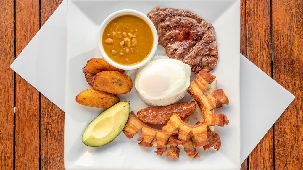Mega Bandeja Paisa · Red beans, rice, egg, fried sweet plantains, sausage corn cake grilled steak, pork, and avocado.