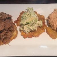 Patacones/Fried Green Plantains · Three pieces.