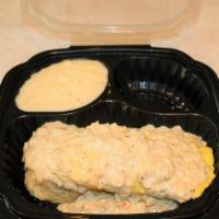 Biscuit Eggs And Gravy · Split biscuit topped with scrambled eggs and our own chicken sausage gravy, served with a ch...
