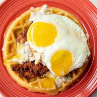 Dirty Bird · A golden Belgian waffle topped with crispy buttermilk chicken tenders, two eggs and chicken ...