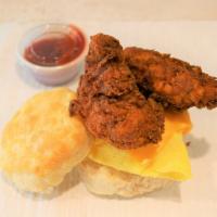 Fried Chicken, Egg And Cheese Biscuit · Biscuit sandwich with scrambled egg, American cheese and crispy buttermilk chicken tenders.