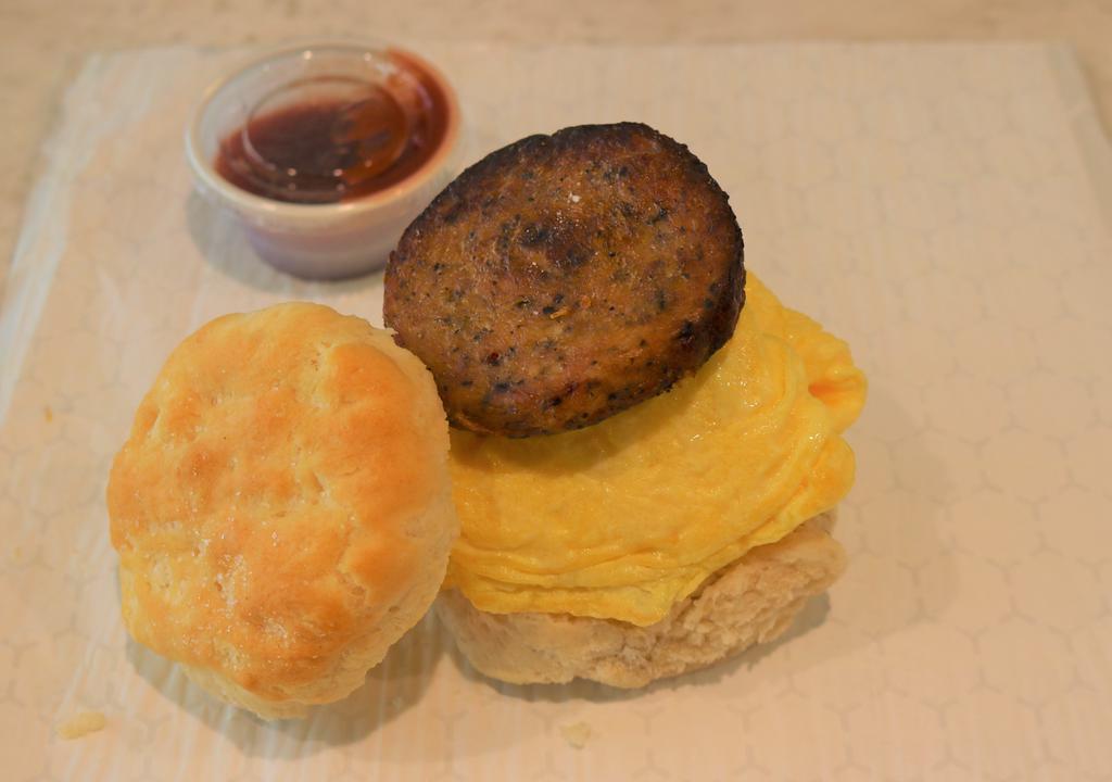 Sausage And Egg Biscuit · Biscuit sandwich with chicken sausage and scrambled egg.