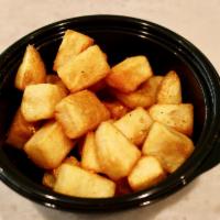 Moon Dusted Potatoes · Breakfast potatoes with rosemary house seasoning.