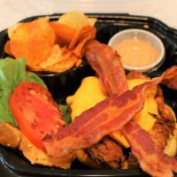 Chicken Club Sandwich · Crispy buttermilk chicken, melted cheese, crispy all-natural nitrate free applewood bacon, s...