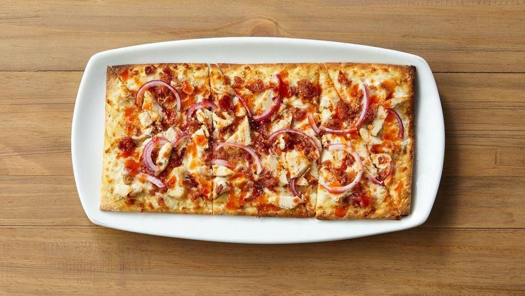 Buffalo Chicken Flatbread · Ranch base, mozzarella cheese, grilled chicken, signature hot sauce, red onions and crumbled bacon.