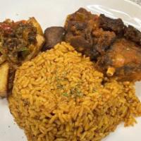 Jollof Rice · Long grain rice slowly cooked in spicy tomato sauce with fresh herbs and seasoning served wi...