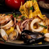 Scoglio Pasta · Shrimp, calamari, octopus, and clams with the sauce of your preference alfredo sauce, pomodo...