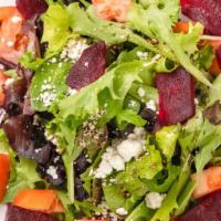 Di Barbabietola · Roasted beets with goat cheese and mix greens.