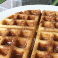 Churro Waffle · 6 in waffle, buttered, tossed in organic cane sugar and cinnamon, drizzled with maple syrup