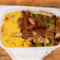 Pepper Steak With Onion · Served with white rice.