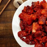 Spare Rib Tips 排骨尾 · Pork tips Served with choice of side. Add side for an additional charge