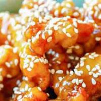 Sesame Chicken · Served with a choice of pork fried rice white rice egg drop soup wonton soup or egg roll. 1