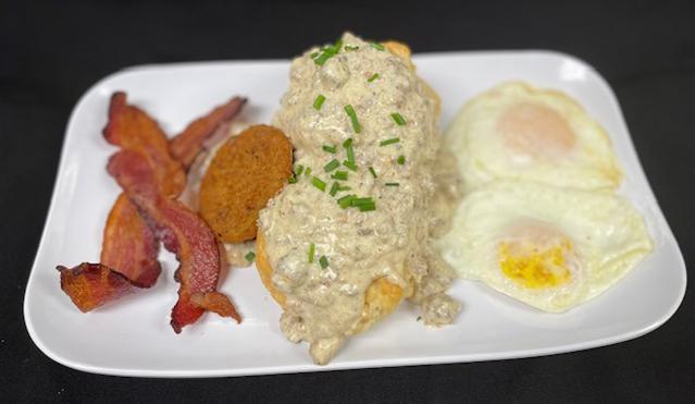 Biscuits & Gravy · Two buttermilk biscuits covered in Swaggerty's Country Sausage gravy, served with two eggs any style, fried green tomato, and applewood-smoked bacon