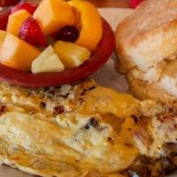 Three Little Pigs Omelet · Applewood-smoked bacon, ham & sausage with swiss cheese. Served with a buttermilk biscuit an...