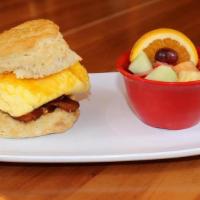 Breakfast Sandwich · Choice of meat, cheese and egg served on a Buttermilk Biscuit with choice of side