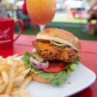 Fried Chicken Sandwich · Fried chicken topped with cheddar cheese, dressed with lettuce, tomato, red onion, pickles a...