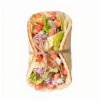 Traditional Gyro · Freshly roasted gyro meat with crisp lettuce, tomatoes & onions, homemade tzatziki sauce on ...