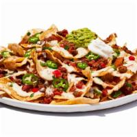 Tex Mex Nachos · You’ve struck gold. Tortilla chips loaded with cheese and chili, piled high with guacamole, ...