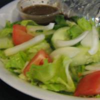 Side Tossed Salad · Romaine and iceberg lettuce, tomatoes, cucumbers, onions, served with balsamic, honey mustar...
