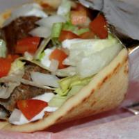 Gyro Sandwich · The traditional! Shaved roast lamb and beef topped with lettuce, tomato, onion, and our home...