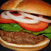 Hamburger · 1/2 Lb. all beef patty topped with lettuce, tomato, onion and served on a toasted bun.