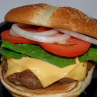 American Cheeseburger · 1/2 Lb. all beef patty, topped with melted American cheese, lettuce, tomato, onion on a toas...