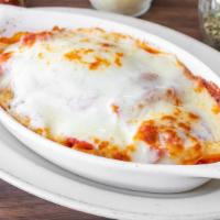 Baked Penne Pasta · Baked penne topped with marinara and mozzarella. Comes with salad, and bread.