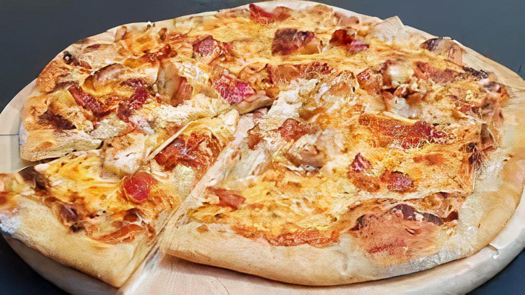 Carbonara Pizza · Bacon, egg and parmesan cheese.
