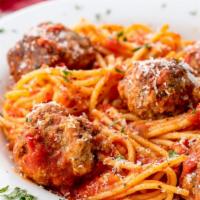Pasta With Meatballs · Homemade red sauce topped with three large beef meatballs.