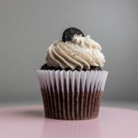 Oreo Cupcake · Chocolate cake topped with cookies and cream icing.