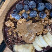 Amazonian Acai Bowl · Acai, banana, blueberries, pineapple, and almond milk. Topped with banana, blueberries, coco...