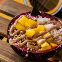 Dragon Bowl · Dragon fruit, banana, strawberry and coconut milk. Topped with mango, coconut flakes, granol...