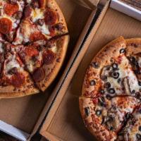 Pizza Party To-Go · Your choice of a Salad Platter and three Large Specialty Pizzas. Served with two Big Cookies...